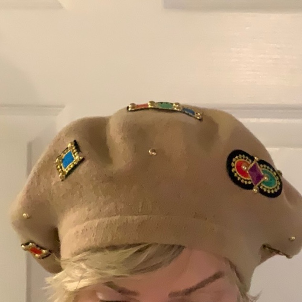 FINESSE ladies tan wool hat with beaded embellishments.